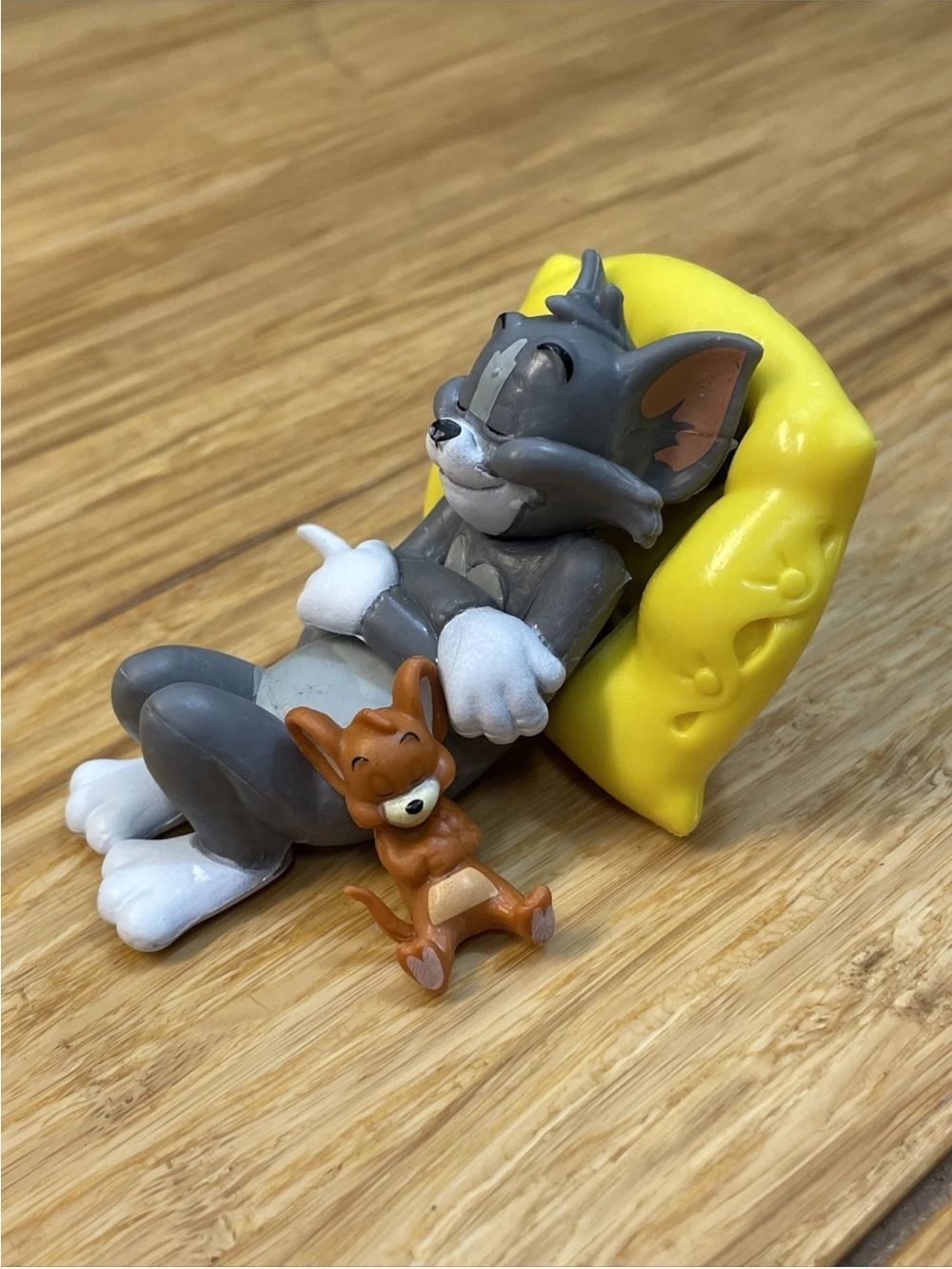 Warner Bros. Gray Tom & Brown Jerry with Yellow Cheese Bed Figurine